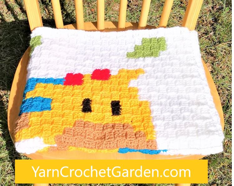 Finished giraffe C2C crochet baby blanket size detail β 30 inch by 37.5 inch corner to corner blanket