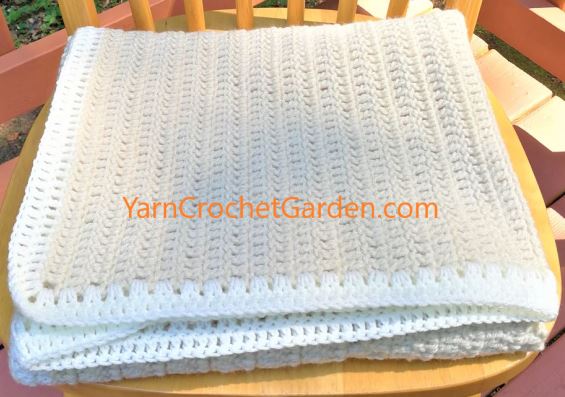 Section of corgi puppy filet crochet blanket showing pattern graph design detail