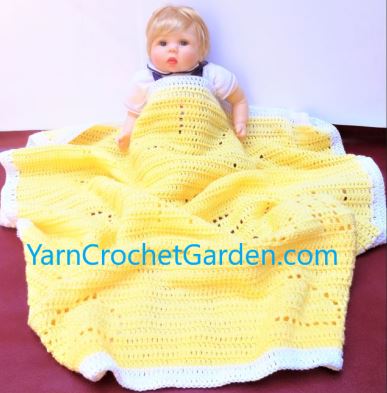 Finished You Are My Sunshine filet crochet baby blanket in white yarn