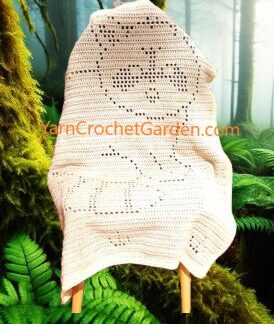 Finished filet crochet raccoon blanket pattern for babies, kids, and adults