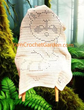 Finished filet crochet raccoon blanket pattern for babies, kids, and adults