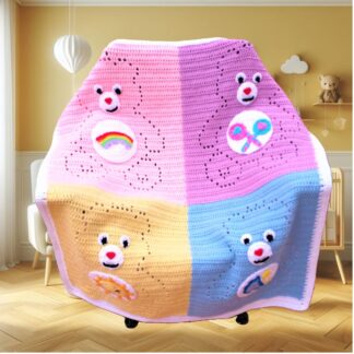Filet crochet blanket featuring 4 cute cartoon-style bears with colorful tummy badges — rainbow, moon, sunshine, and lollipop designs — beginner-friendly PDF pattern for baby to adult sizes