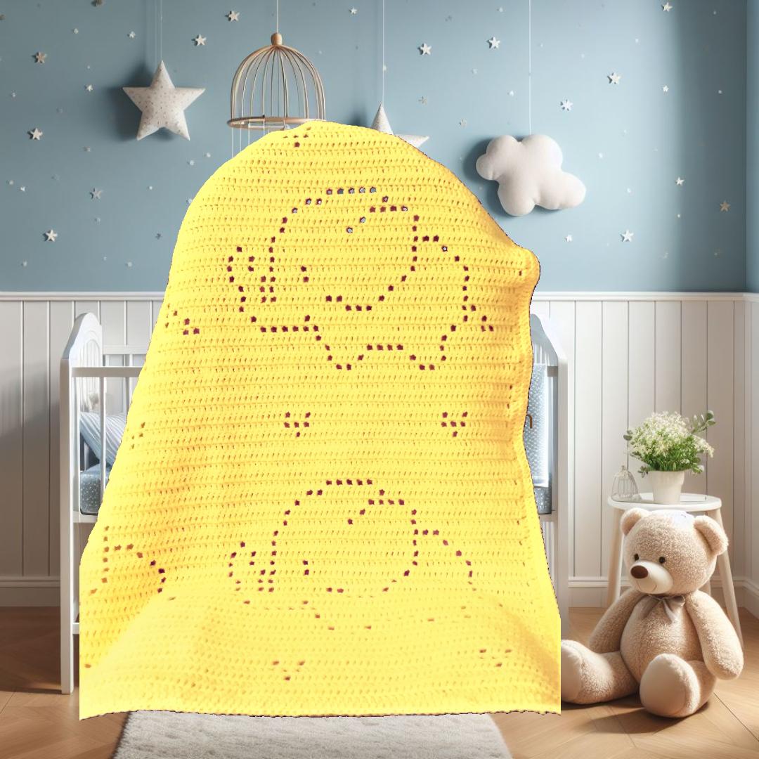 Finished crochet elephant baby blanket featuring a beginner filet design in light yellow yarn.