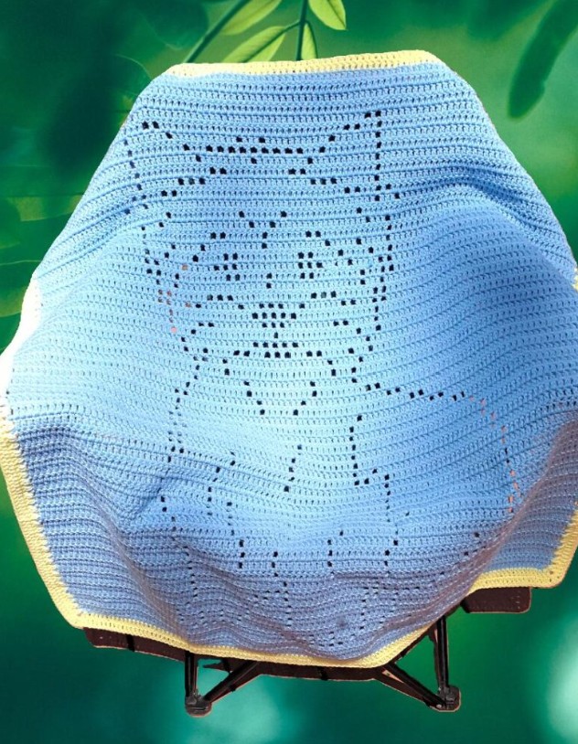 Beginner-friendly Yorkshire Terrier filet crochet baby blanket pattern with a customizable bow