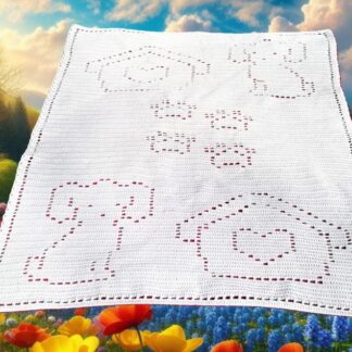 Finished filet crochet blanket featuring a puppy dog, dog house, and paw print design in a neutral color.