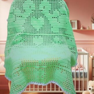 A cozy, one-color filet crochet baby blanket featuring a repeating design of cute sea turtles and hearts.
